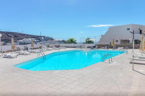 Bazén v ubytování Apartamento Arimar Sunset nebo v jeho okolí