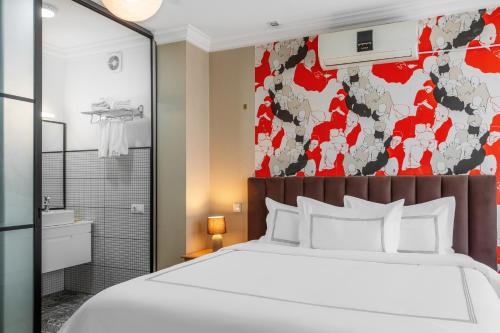 Postel nebo postele na pokoji v ubytování Elea Old Tbilisi Hotel