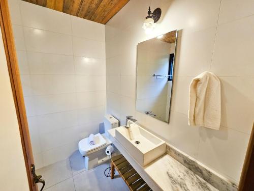 Un baño de Estudios Capivari by The Lodge