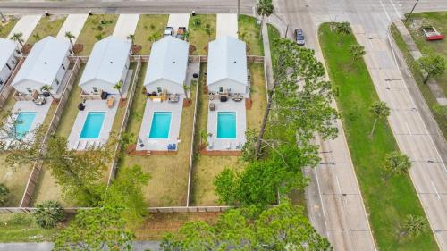 an overhead view of a white house with blue doors at Beach House - Simple Pleasures by Panhandle Getaways in Port Saint Joe