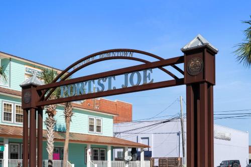 a sign for a street in front of a building at Beach House - Simple Pleasures by Panhandle Getaways in Port Saint Joe