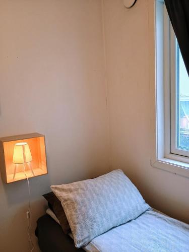 Katil atau katil-katil dalam bilik di Tromso Coco Apartments in Center