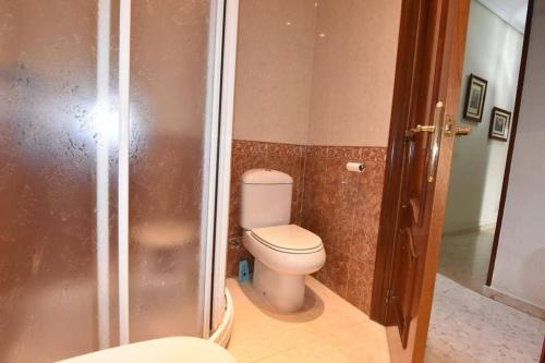 a bathroom with a toilet and a shower at TA Apartments in Mashabbe Sade