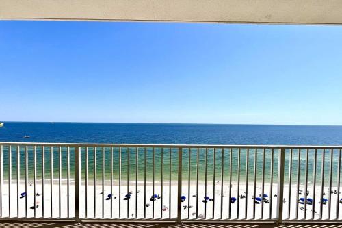 a view of the ocean from a balcony of a beach at Crystal Shores1006 condo in Gulf Shores