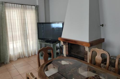 Televisyen dan/atau pusat hiburan di Villa Güezmes