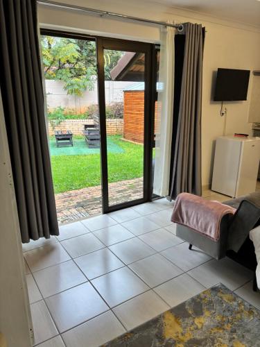 Postel nebo postele na pokoji v ubytování West Cottage