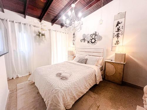 Voodi või voodid majutusasutuse ORHO HOTEL Marbella Panama City toas