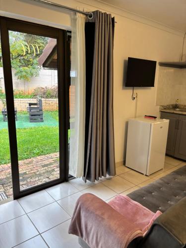 Kuchyň nebo kuchyňský kout v ubytování West Cottage