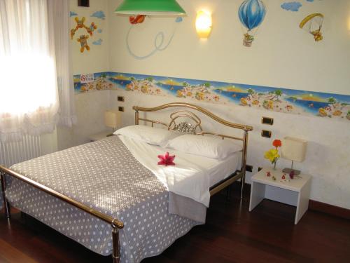 Postel nebo postele na pokoji v ubytování B&B Nelly