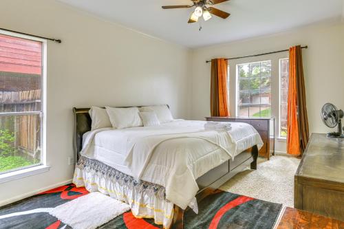 a bedroom with a bed and a window at Home 7 Mi to Energy Corridor Remote-Work Ready! in Houston