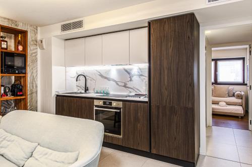 a kitchen with a sink and a counter at Porte de Monaco - Cozy 3 pièces - DE in Cap d'Ail