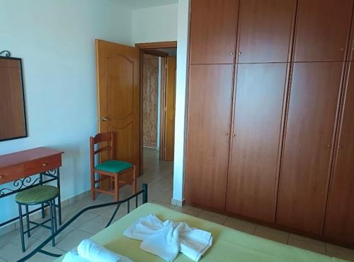 Ένα ή περισσότερα κρεβάτια σε δωμάτιο στο Marialena hotel