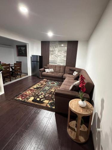 a living room with a couch and a table at Cozy 2 BR Apartment Glendale in Glendale