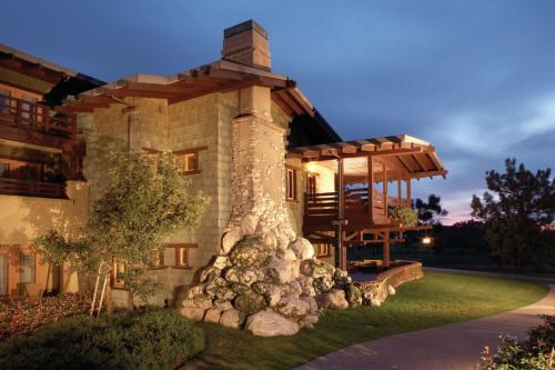 a house with a deck on the side of it at The Lodge at Torrey Pines in San Diego
