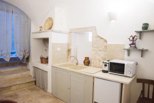 Kuchyň nebo kuchyňský kout v ubytování B&B Arco Nicolaus