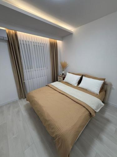 Postel nebo postele na pokoji v ubytování Apartmani Maja