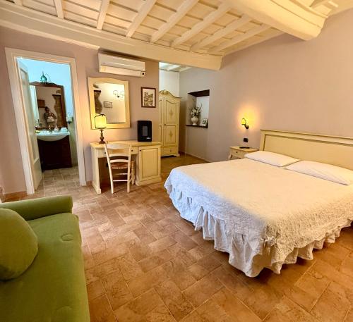 Postel nebo postele na pokoji v ubytování Relais Il Monaco