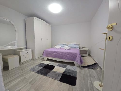 Postel nebo postele na pokoji v ubytování Apartman Nika - Marija