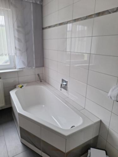 Ένα μπάνιο στο Ferienwohnung bei Ingrid
