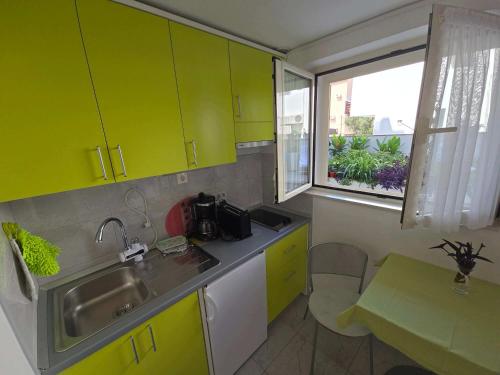 Kuchyň nebo kuchyňský kout v ubytování Apartman Nika - Marija