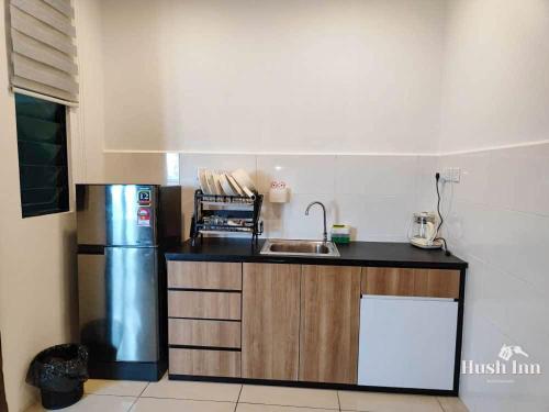 Dapur atau dapur kecil di Hush Inn at ITCC Manhattan Suites