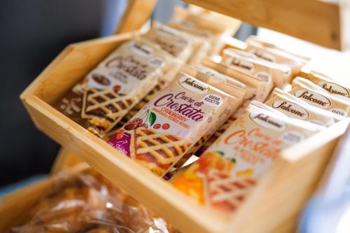 a crate full of waffles and other food items at Terminal 1 Guest House in Naples