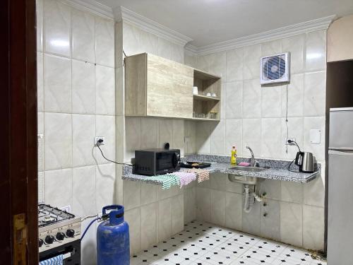 Dapur atau dapur kecil di Sunset Homes in Mohandeseen - Families only