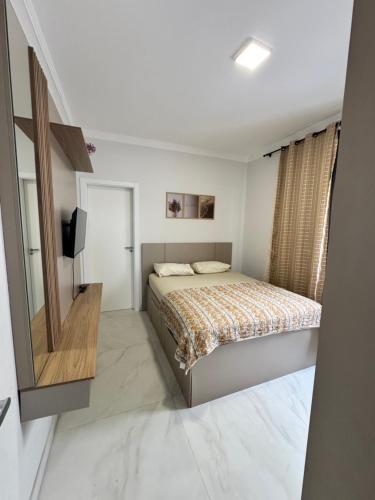 Ένα ή περισσότερα κρεβάτια σε δωμάτιο στο Casa aconchegante !