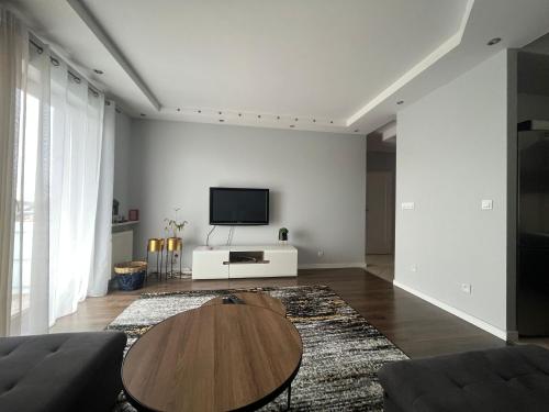 TV a/nebo společenská místnost v ubytování Apartament Jana Pawła