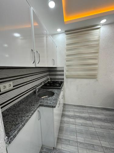 Kuchyň nebo kuchyňský kout v ubytování Sultanahmet Immortelle Apartment