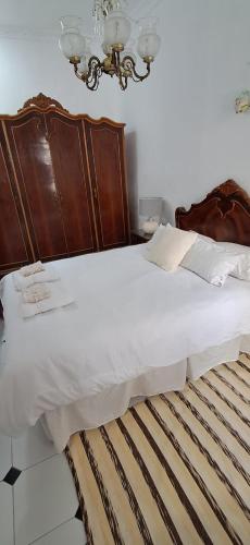 Ένα ή περισσότερα κρεβάτια σε δωμάτιο στο Habitación a compartir en Zoco Home