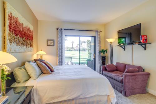 a bedroom with a bed and a couch and a window at Resort Pools and Golf Palm Springs Condo! in Cathedral City