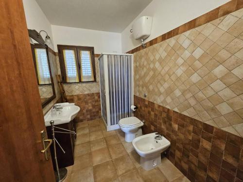 Ένα μπάνιο στο Villa Domo Sardo - Masone pardu
