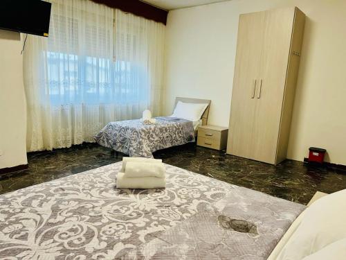 Ένα ή περισσότερα κρεβάτια σε δωμάτιο στο Cozy stay