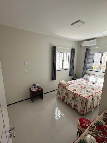 Giường trong phòng chung tại Casa no Recanto dos Vinhais