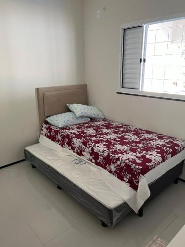 Giường trong phòng chung tại Casa no Recanto dos Vinhais
