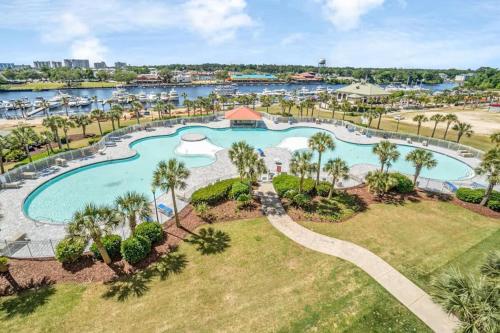 an aerial view of a pool at a resort at Stay Salty-Barefoot Resort, 2 Pools, 2 miles to beach, Golf view in North Myrtle Beach
