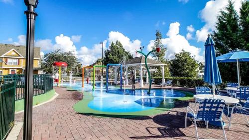 a playground with a water park with a slide at Relaxing 3BR Haven for 8 at Seven Dwarfs SD2610 in Kissimmee