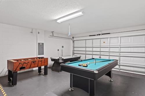 a room with two pool tables in it at Ground floor spacious house 4BR VP2512 in Kissimmee
