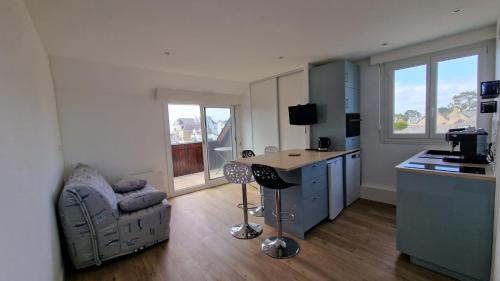 TV a/nebo společenská místnost v ubytování La Cormorane