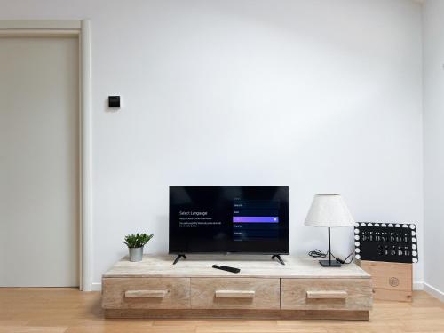 Μια τηλεόραση ή/και κέντρο ψυχαγωγίας στο Loft62 - Centralissimo e tranquillo con parcheggio