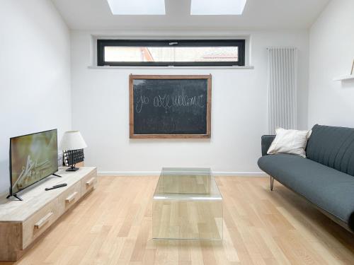 Μια τηλεόραση ή/και κέντρο ψυχαγωγίας στο Loft62 - Centralissimo e tranquillo con parcheggio