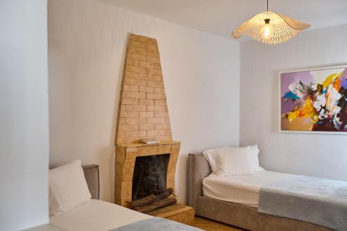 Cama o camas de una habitación en Zens Villa Dhermi Village Escape