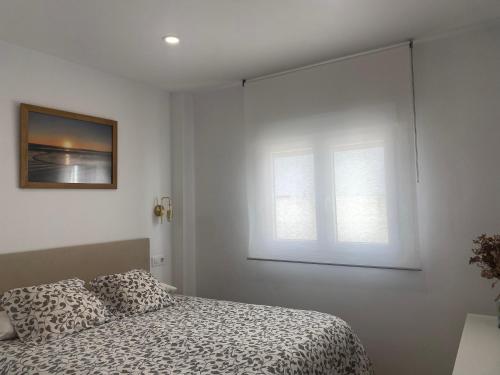 Cama o camas de una habitación en Piso playa Barbate Oleaje
