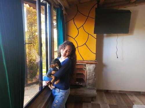 TV a/nebo společenská místnost v ubytování El Chalet Ecoposada