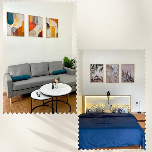 a living room with a couch and a table at Casamigos Cosy one bedroom appartment in Dakar