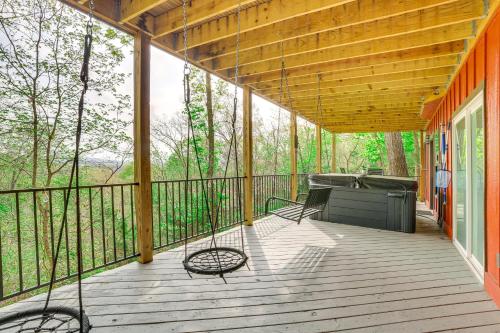 a screened porch with a hammock and a grill at Pet-Friendly Branson Area Home Hot Tub, Game Room in Reeds Spring