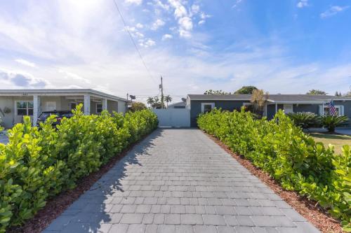 a brick walkway in front of some houses at Charming 1 Bedroom Apartment in Homestead