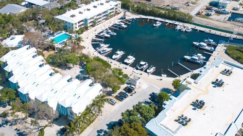 an overhead view of a marina with boats in it at 809 Mariners Club in Key Largo