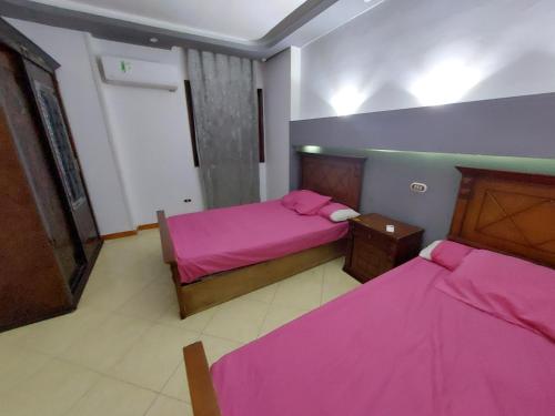 Postel nebo postele na pokoji v ubytování Charming Miramar Aparthotel